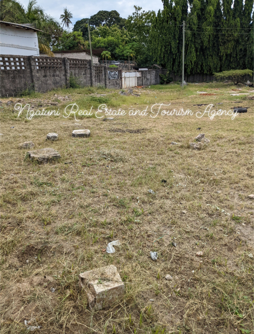 A Prime Plot with a fence is Available For Sale At Kinondoni Tx market, Dar Es Salaam Tanzania East Africa